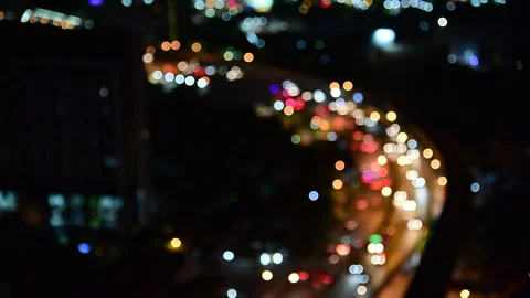Blurred background night city bokeh car drive on road in nightlife Видео 247426708