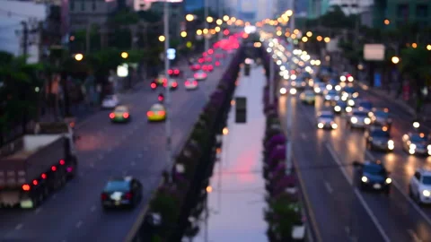 Blurred background night city bokeh car drive on road in nightlife Video stock 249141999