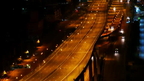 Blurred background night city bokeh car drive on road in nightlife Stockbeeldmateriaal 274459195