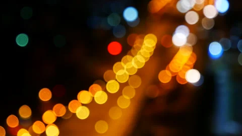 Blurred background night city bokeh car drive on road in nightlife 库存影片 274459240