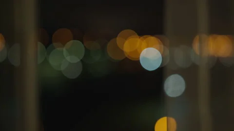 Blurred background from a night window covered with tulle Stock Footage 153874447