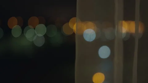 Blurred background of night window with curtain Stock Footage 154973679