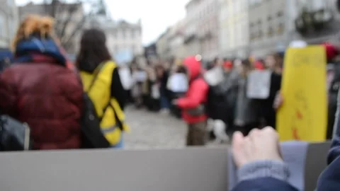 Blurred background People are standing in the square in protest. Stock Footage