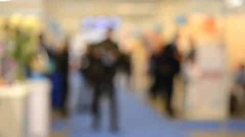 Blurred Background people at mall exhibition Stock Footage