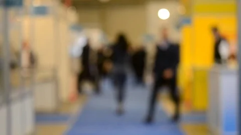 Blurred Background people at mall exhibition Stock Footage