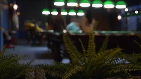 Blurred background. people play billiards in a billiard club Stock Footage 117031424