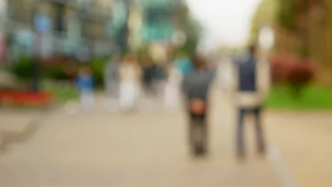 Blurred background. people walk around the city. urban lifestyle background Stock Footage 106729393