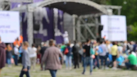 Blurred background. Performance on stage. Crowd of people standing near stage Stock Footage 250748709