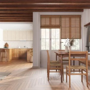 Blurred background, rustic wooden kitchen and dining room. Cabinets and par.. Illustrazione stock