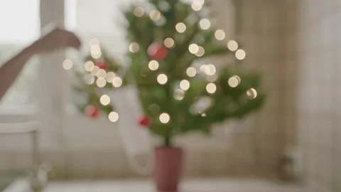 A Blurred Background Scene Of A Face Mask Hung On A Christmas Tree In Covid Xmas Stock Footage 142007971