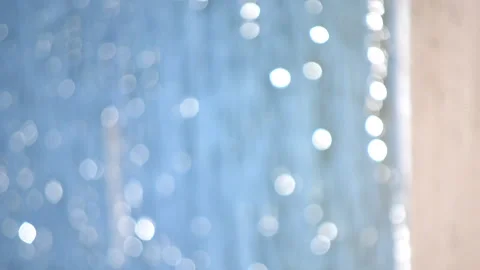 Blurred background. Sea, white sun reflections and yellow sandy beach Stock Footage 200817428