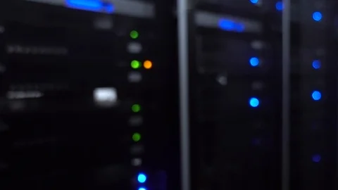 Blurred background. Server rack with flashing blue lights 動画素材 108610262