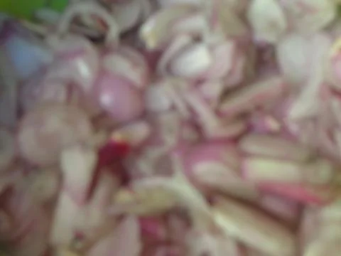 A blurred background of sliced shallots cut into small pieces Stock Photos