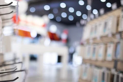 Blurred background from small electronics store and cellular accessories 스톡 사진
