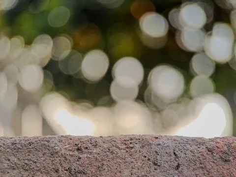 Blurred background with soft, circular bokeh lights and a textured foregrou.. Stock Photos