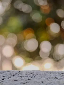 Blurred background with soft, circular bokeh lights and a textured foregrou.. Stock Photos