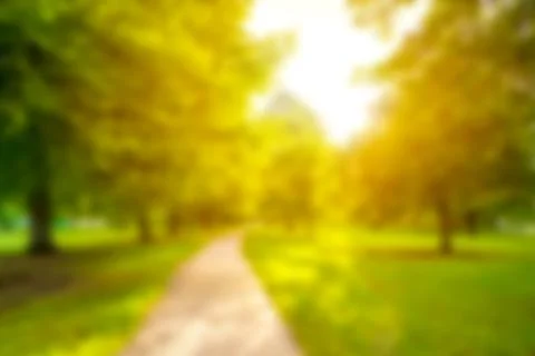 Blurred background in spring time of city park Stock Photos