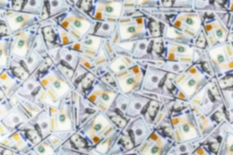 Blurred background with Stack of one hundred dollar bills. Blur Stack of ca.. Foto stock