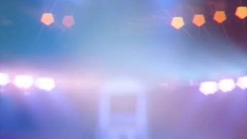 Blurred background with the stage lights and spotlights on the concert scene Видео 142821941