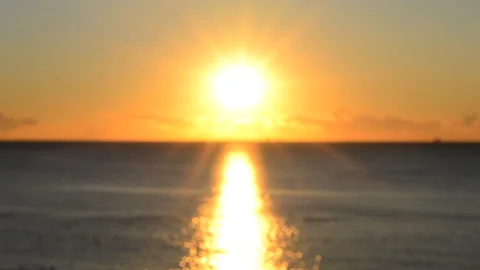 Blurred background. The sun shining in the sky during sunset dawn. Stock Footage 218478695