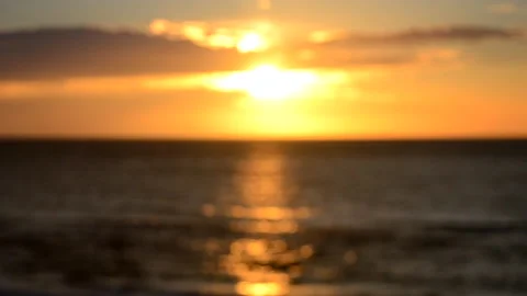 Blurred background. The sun shining in the sky during sunset dawn. Stock Footage 218640297