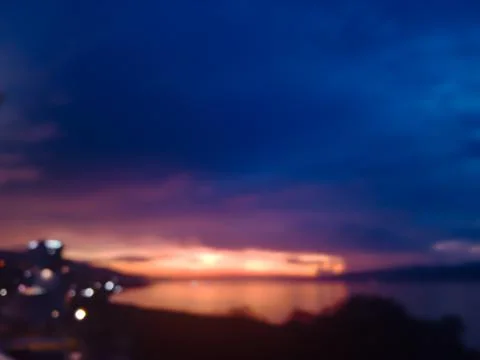 Blurred background of sunset over Ambon bay, Maluku, Indonesia. Stock-Fotos