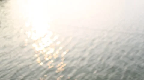 Blurred background of sunset on the water surface Stock Footage 54262204