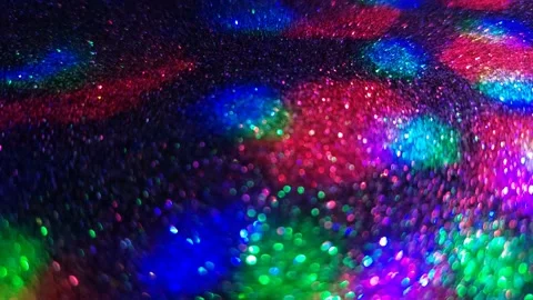 Blurred background of swirling ball of light and music Stock Footage 163745419