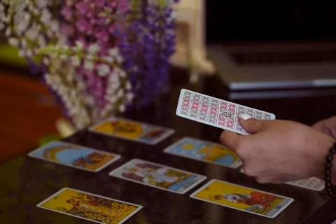 Blurred background of Tarot cards on table Stock Photos