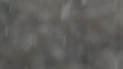 Blurred background. Texture. Winter. It's snowing. Snowflakes fall. Video stock 66878823