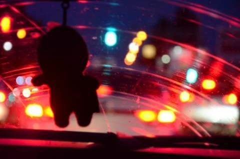 Blurred background on the theme of night car trips in the big city. Stock Photos