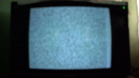 Blurred background, TV without a signal snows. White noise on an old TV screen Stock Footage 237096832