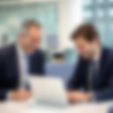 Blurred Background of Two Happy Executives Collaborating on Laptop Stock Photos