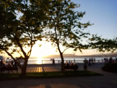 Blurred background with a view of the public beach. Stock Photos