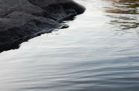 Blurred background, water surface close-up, beautiful abstract background, fa Stock Photos