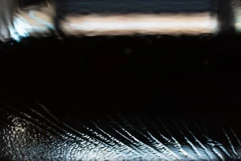 Blurred background of window sprayed with water. Stock Photos