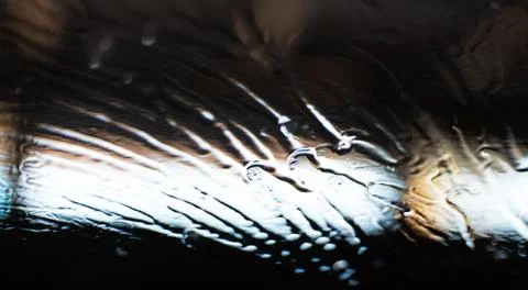 Blurred background of window sprayed with water. Stock Photos