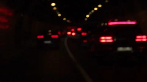 Blurred background, windshield view of car traffic in the tunnel Video stock 279815176