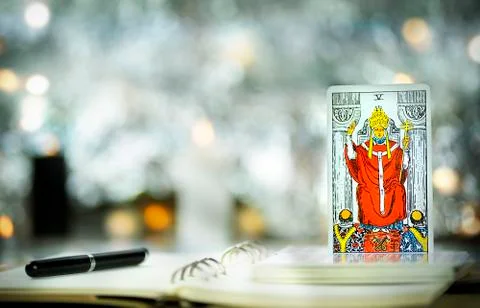 Blurred background of winter composition with tarot cards, hierophant Stock Photos