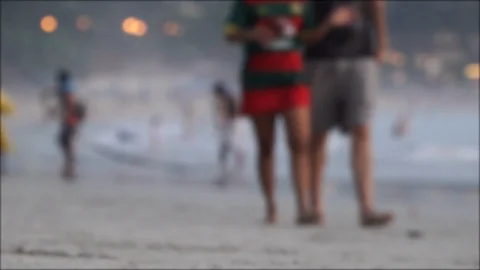 Blurred beach background on the shore with walking people. Stock Footage 120022956