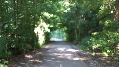 Blurred bike path background the background Stock Footage 246774296