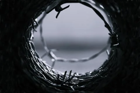 Blurred Black and whith Close up of barbed or barb wire background Stock Photos