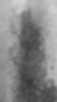 Blurred black vertical shot with the rusty iron background. Abstract metal. Stock Photos