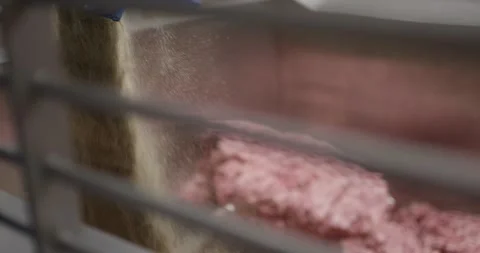 Blurred blue apron moving through a food production room, Factory Interior Stock Footage 340041928