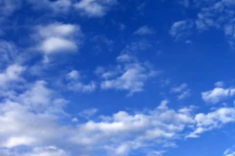 Blurred blue cloudy sky Stock Photos
