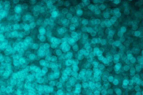 Blurred blue defocused light. Pattern background. Holiday glowing party Stock Photos