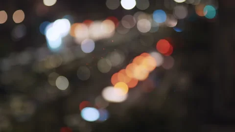 Blurred bokeh background of night traffic jam on the road, blurred blinking Stock Footage 228972950
