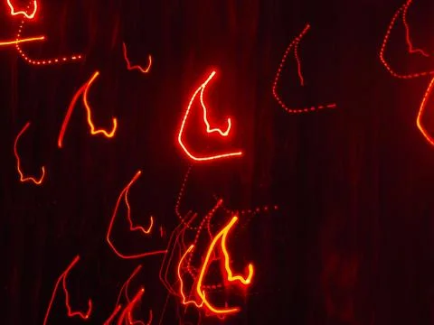Blurred bokeh background of red lights Stock Photos