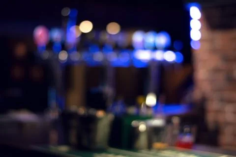 Blurred bokeh of the bar counter. Stock Photos