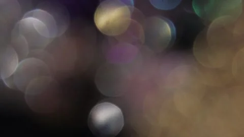 Blurred bokeh with full-screen rainbow-colored sparkling lights overlay Vídeo Stock 317460086